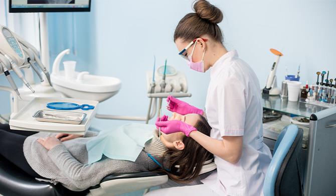 Dentists performing a dental procedure